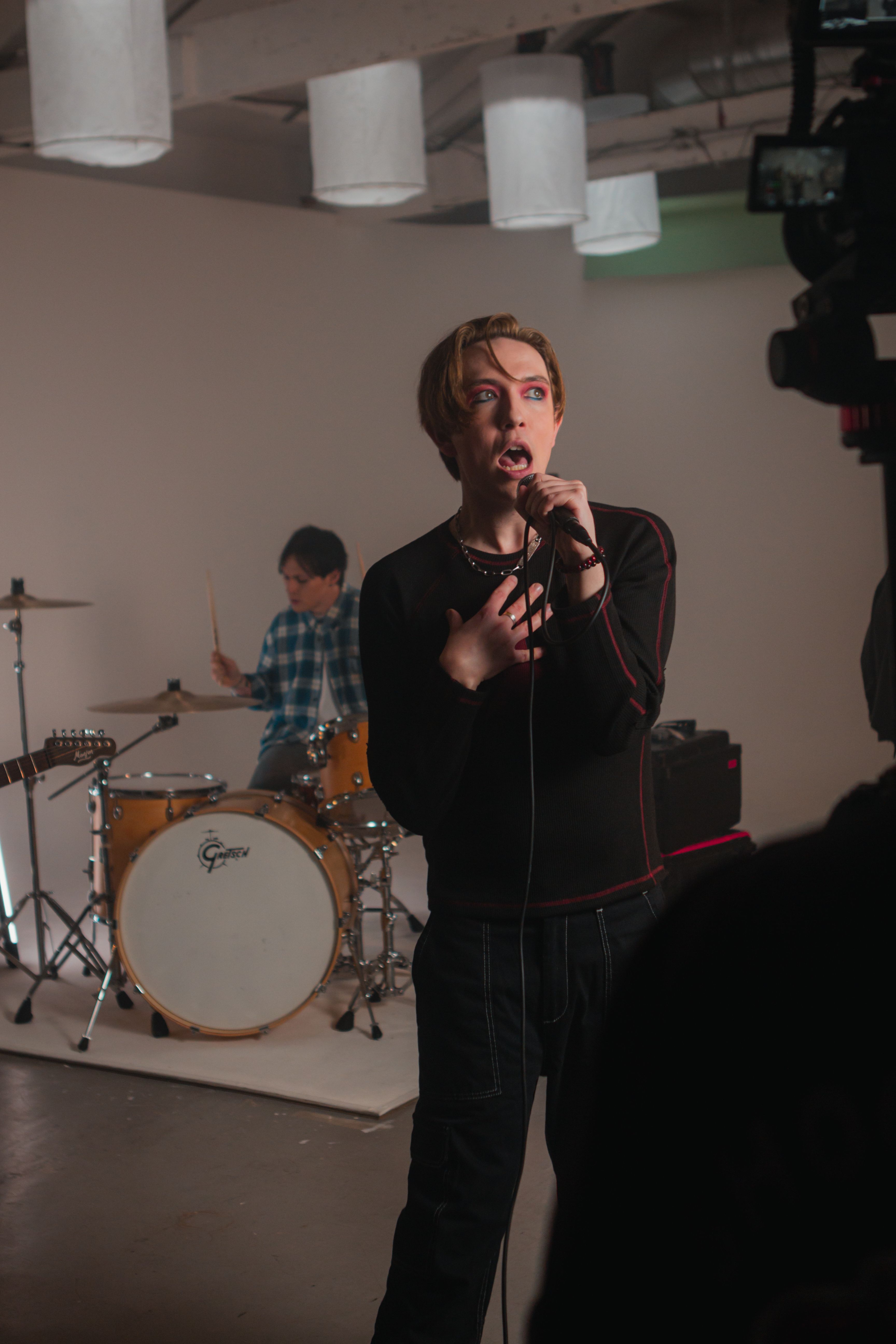 a person with a microphone singing